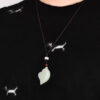 A pair of white jade couples with jade pendants for men and women